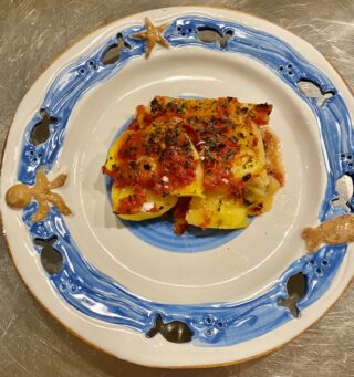 Baccalà in forno patate e pomodori