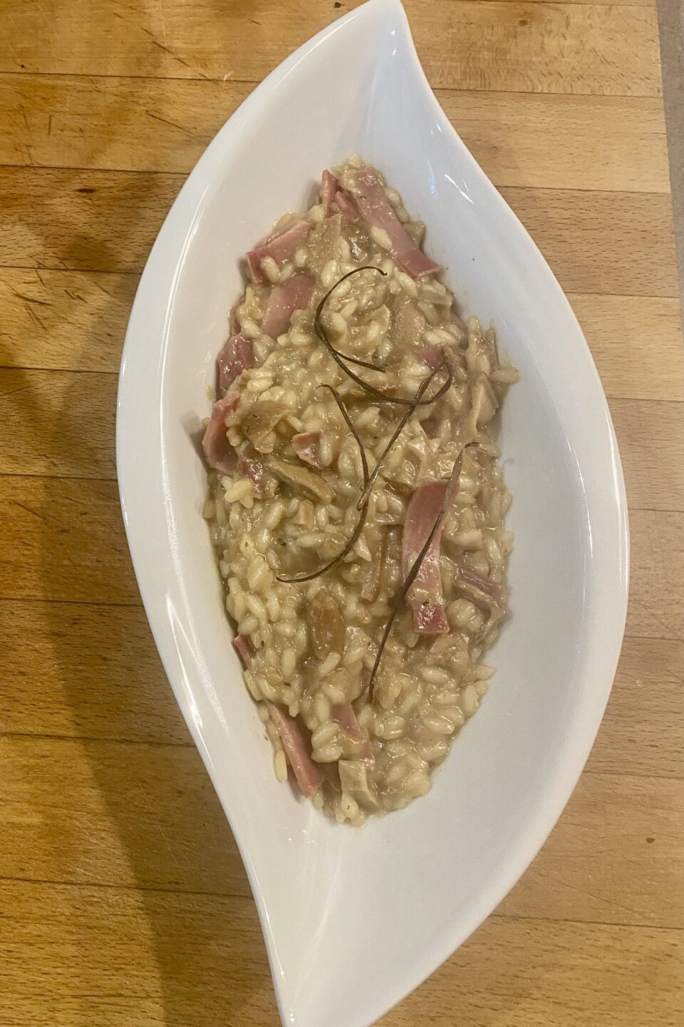 Risotto porcini secchi speck crema melanzane