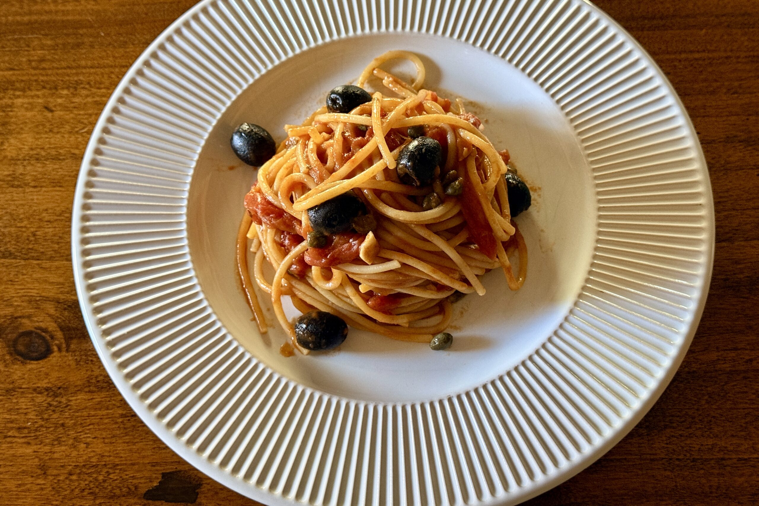 Spaghetti alla puttanesca, ricetta tradizionale di Ischia